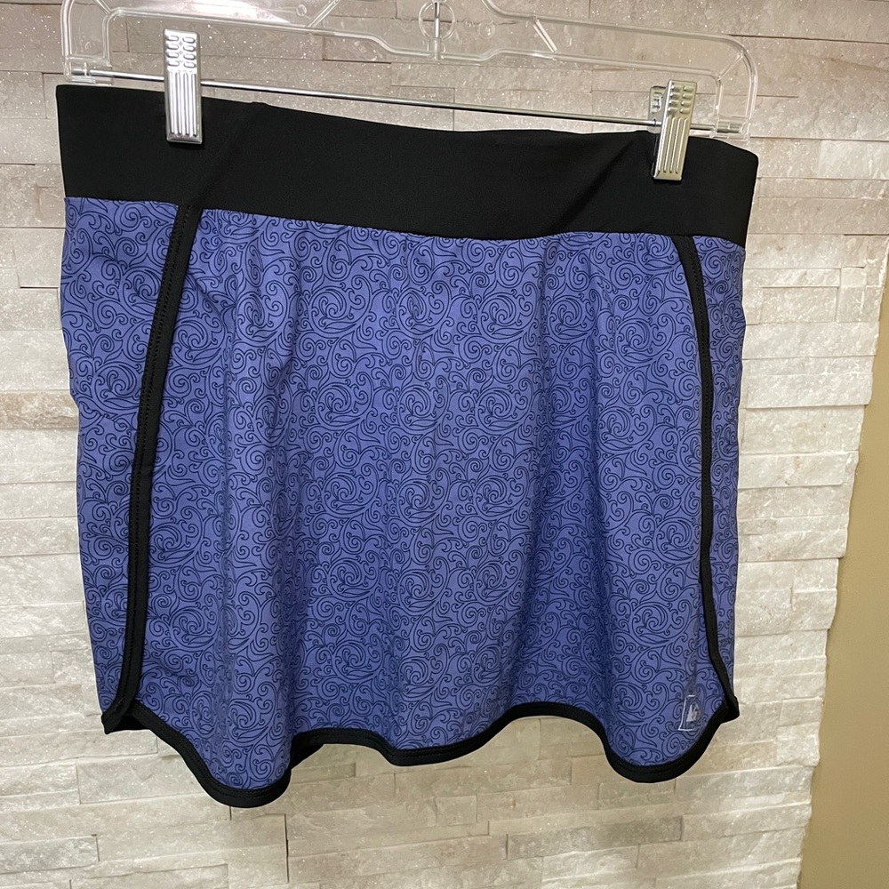 REI Skort Small. Black and purple paisley athletic skort.